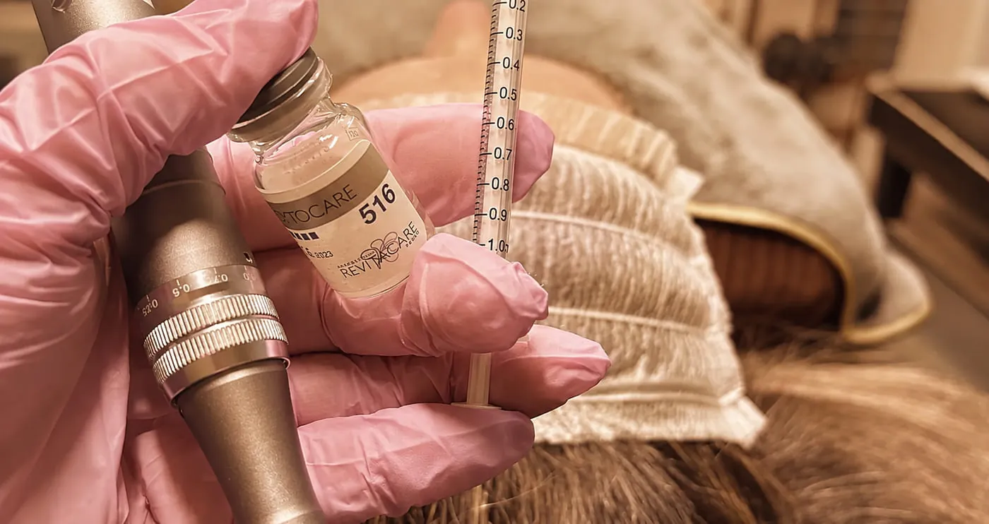 A serum vial and treatment pen prepared during a skin treatment at Roniya Aesthetic Clinic